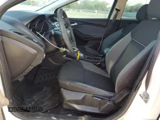 2014 Ford Focus SE with VIN 1FADP3F27EL412368, listed as a Copart auction lot 51463155 with 143,484 mi miles and Salvage Title. Bid and sale history available at DreamBid. Image 7.