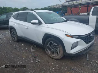 2022 Hyundai Tucson SEL z VIN 5NMJC3AE9NH147478, wystawiony jako IAAI lot #42540230 z przebiegiem 58 683 mil mil oraz . Historia ofert i sprzedaży dostępna na DreamBid. Obrazek 1.