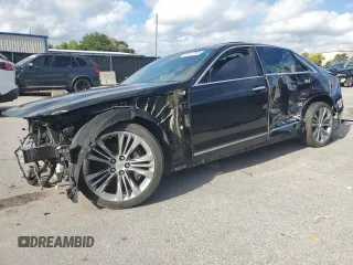 2016 Cadillac CT6 Platinum AWD with VIN 1G6KK5R61GU156660, listed as a Copart auction lot 61947755 with 112,499 mi miles and Salvage title. Bid and sale history available at DreamBid. Image 1.