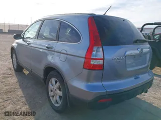 2009 Honda CR-V EX-L with VIN 5J6RE48749L028732, listed as a IAAI auction lot 41884092 with 164,402 mi miles. Bid and sale history available at carsss.com. Image 3.