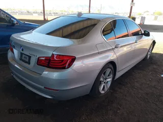 2013 BMW 5 Series 528i with VIN WBAXG5C56DDY36275, listed as a IAAI auction lot 41881102 with 104,022 mi miles and . Bid and sale history available at carsss.com. Image 4.