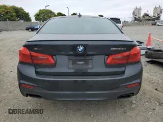 2019 BMW 5 Series M550i xDrive with VIN WBAJB9C53KB464298, listed as a Copart auction lot 59892105 with Not provided miles and Salvage title. Bid and sale history available at DreamBid. Image 6.