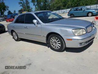 2004 Hyundai XG350 with VIN KMHFU45E44A364184, listed as a Copart auction lot 52689345 with 154,377 mi miles and Salvage Title. Bid and sale history available at carsss.com. Image 4.