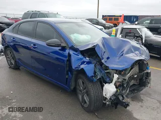 2021 Kia Forte GT-Line z VIN 3KPF34AD3ME403218, wystawiony jako IAAI lot #42375319 z przebiegiem 56 621 mil mil oraz . Historia ofert i sprzedaży dostępna na DreamBid. Obrazek 1.
