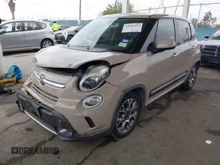 2014 FIAT 500L Trekking with VIN ZFBCFADHXEZ015287, listed as a IAAI auction lot 42063297 with 81,858 mi miles and . Bid and sale history available at DreamBid. Image 2.