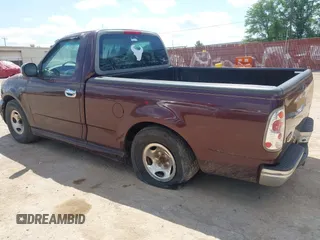 1998 Ford F-150 with VIN 1FTZF1725WNB72765, listed as a IAAI auction lot 42056766 with 210,459 mi miles and . Bid and sale history available at DreamBid. Image 3.