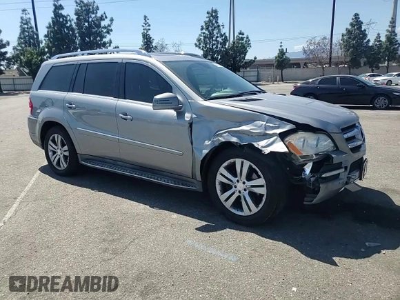 2012 Mercedes-Benz GL 450 z VIN 4JGBF7BE2CA766315, wystawiony jako Copart lot #56687985 z przebiegiem 180 016 mil mil oraz Szkoda całkowita • Salvage title. Historia ofert i sprzedaży dostępna na DreamBid. Obrazek 14.