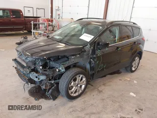 2014 Ford Escape SE with VIN 1FMCU9G95EUA16328, listed as a IAAI auction lot 42464235 with 108,570 mi miles and . Bid and sale history available at DreamBid. Image 17.