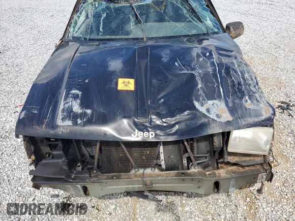 1996 Jeep Grand Cherokee Laredo with VIN 1J4FX58S6TC349590, listed as a Copart auction lot 72278714 with 0 mi miles and Salvage Title. Bid and sale history available at carsss.com. Image 13.