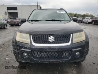 2009 Suzuki Grand Vitara z VIN JS3TE149794100133, wystawiony jako Copart lot #52919795 z przebiegiem 207 928 mil mil oraz Szkoda całkowita • Salvage title. Historia ofert i sprzedaży dostępna na DreamBid. Obrazek 5.