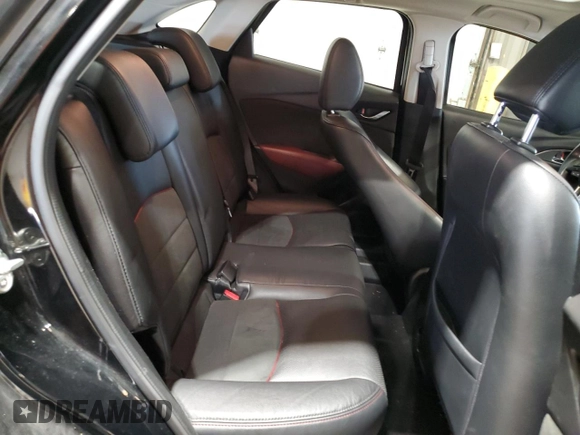 2017 Mazda CX-3 Grand Touring z VIN JM1DKFD71H0141595, wystawiony jako Copart lot #54377305 z przebiegiem 60 907 mil mil oraz Szkody całkowita. Historia ofert i sprzedaży dostępna na DreamBid. Obrazek 11.