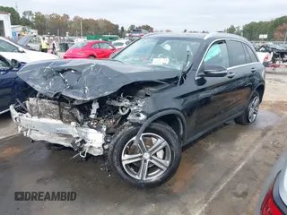 2016 Mercedes-Benz GLC with VIN WDC0G4KB9GF085925, listed as a IAAI auction lot 40804297 with 77,297 mi miles. Bid and sale history available at carsss.com. Image 2.