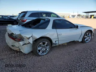 1995 Mitsubishi 3000GT VR-4 z VIN JA3AN74KXSY031947, wystawiony jako Copart lot #82468544 z przebiegiem 163 879 mil mil oraz Szkoda całkowita • Salvage title. Historia ofert i sprzedaży dostępna na DreamBid. Obrazek 3.