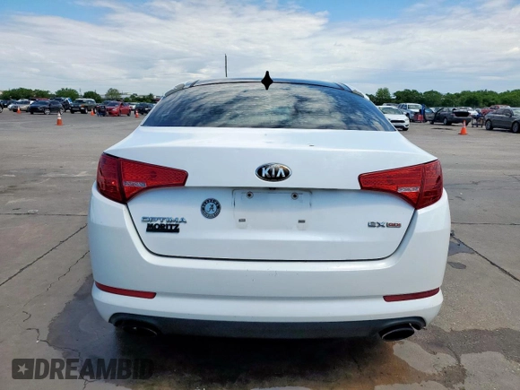 2013 Kia Optima EX с VIN 5XXGN4A77DG182352, выставлен на аукционе Copart как лот 54130995 с пробегом 174 866 миль миль и Чистый • Clean title. История ставок и продаж доступна на DreamBid. Изображение 6.