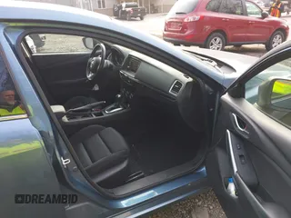 2015 Mazda 6 i Sport with VIN JM1GJ1U54F1193781, listed as a IAAI auction lot 40891523 with 95,196 mi miles. Bid and sale history available at carsss.com. Image 5.