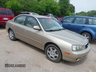 2003 Hyundai Elantra GLS z VIN KMHDN45D73U556305, wystawiony jako IAAI lot #42478211 z przebiegiem 149 648 mil mil oraz . Historia ofert i sprzedaży dostępna na DreamBid. Obrazek 1.