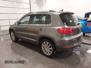 2016 Volkswagen Tiguan SE z VIN WVGBV7AX3GW507850, wystawiony jako IAAI lot #41303866 z przebiegiem 97 989 mil mil oraz . Historia ofert i sprzedaży dostępna na DreamBid. Obrazek 3.