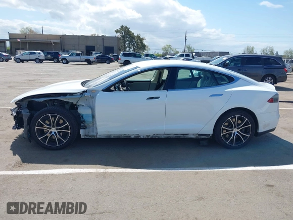 2014 Tesla Model S 60 with VIN 5YJSA1H10EFP56526, listed as a IAAI auction lot 41871784 with 143,361 mi miles and . Bid and sale history available at DreamBid. Image 15.