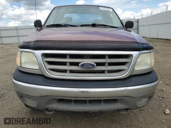 2003 Ford F-150 XL z VIN 2FTPX18LX3CA36886, wystawiony jako Copart lot #58194385 z przebiegiem 302 328 mil mil oraz Czysty tytuł • Clean title. Historia ofert i sprzedaży dostępna na DreamBid. Obrazek 5.