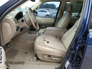 2004 Mercury Mountaineer Convenience z VIN 4M2ZU86K44ZJ49011, wystawiony jako Copart lot #69615444 z przebiegiem 135 702 mil mil oraz Szkoda całkowita • Salvage title. Historia ofert i sprzedaży dostępna na DreamBid. Obrazek 7.