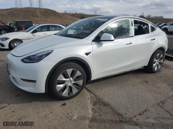 2021 Tesla Model Y Long Range with VIN 5YJYGDEEXMF299515, listed as a Copart auction lot 51978555 with 30,459 mi miles and Salvage Title. Bid and sale history available at carsss.com. Image 1.