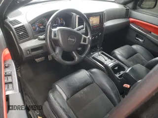2008 Jeep Grand Cherokee SRT-8 with VIN 1J8HR78398C214004, listed as a Copart auction lot 48760375 with 165,318 mi miles and Salvage Title. Bid and sale history available at carsss.com. Image 8.