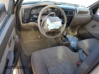 1999 Toyota Tacoma PreRunner with VIN 4TASM92N5XZ559667, listed as a Copart auction lot 89322855 with 233,037 mi miles and Salvage title. Bid and sale history available at DreamBid. Image 8.