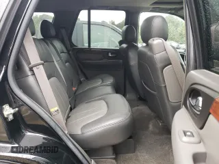 2004 GMC Envoy SLT with VIN 1GKDT13S942279670, listed as a Copart auction lot 73527974 with 120,425 mi miles and Salvage Title. Bid and sale history available at DreamBid. Image 11.