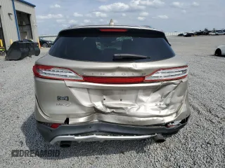 2015 Lincoln MKC with VIN 5LMTJ2AH8FUJ10105, listed as a Copart auction lot 51577095 with Not Provided miles and Salvage Title. Bid and sale history available at carsss.com. Image 6.