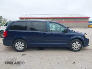 2014 Dodge Grand Caravan SE z VIN 2C4RDGBG6ER113768, wystawiony jako IAAI lot #42280226 z przebiegiem 210 388 mil mil oraz . Historia ofert i sprzedaży dostępna na DreamBid. Obrazek 14.