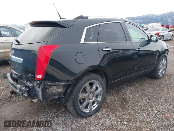 2012 Cadillac SRX Premium Collection with VIN 3GYFNFE35CS599969, listed as a IAAI auction lot 41764337 with 154,864 mi miles and . Bid and sale history available at DreamBid. Image 4.