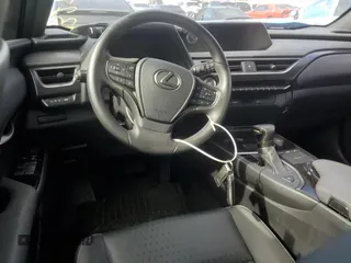 2022 Lexus UX 200 with VIN JTHX3JBH0N2049742, listed as a Copart auction lot 43215465 with 18,728 mi miles and Salvage title. Bid and sale history available at DreamBid. Image 8.