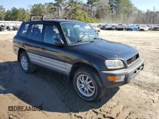 2000 Toyota RAV4 z VIN JT3HP10V6Y0237835, wystawiony jako Copart lot #44999905 z przebiegiem 150 382 mil mil oraz Szkoda całkowita • Salvage title. Historia ofert i sprzedaży dostępna na DreamBid. Obrazek 4.