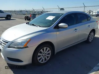 2015 Nissan Sentra SV with VIN 3N1AB7AP1FY219540, listed as a IAAI auction lot 42142798 with 119,106 mi miles and . Bid and sale history available at DreamBid. Image 2.