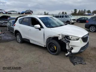 2015 Mazda CX-5 Sport with VIN JM3KE4BY9F0482410, listed as a Copart auction lot 50517175 with 195,709 mi miles and Salvage Title. Bid and sale history available at carsss.com. Image 4.
