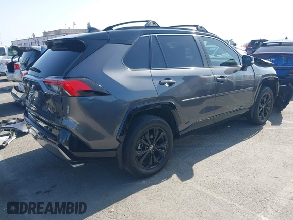 2023 Toyota RAV4 Hybrid XSE with VIN 4T3E6RFV6PU120175, listed as a IAAI auction lot 42499631 with 27,452 mi miles and . Bid and sale history available at DreamBid. Image 4.