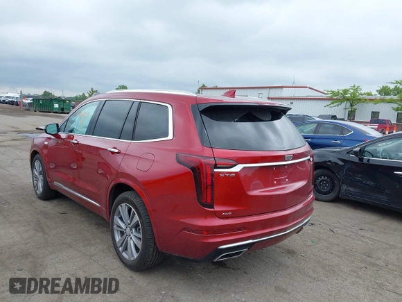 2024 Cadillac XT6 AWD Premium Luxury with VIN 1GYKPDRSXRZ724989, listed as a IAAI auction lot 42378559 with 22,520 mi miles and . Bid and sale history available at DreamBid. Image 3.
