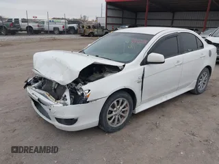 2014 Mitsubishi Lancer ES with VIN JA32U2FU4EU002366, listed as a IAAI auction lot 41942673 with 117,934 mi miles. Bid and sale history available at carsss.com. Image 2.