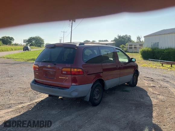 1999 Toyota Sienna LE with VIN 4T3ZF13C5XU141279, listed as a Copart auction lot 64366315 with 218,223 mi miles and Clean title. Bid and sale history available at DreamBid. Image 4.