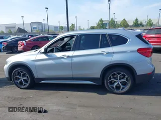 2019 BMW X1 xDrive28i with VIN WBXHT3C56K5L38658, listed as a IAAI auction lot 42496734 with 49,373 mi miles and . Bid and sale history available at DreamBid. Image 14.
