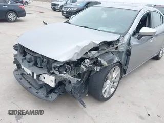 2015 Mazda 6 i Touring with VIN JM1GJ1V56F1209476, listed as a IAAI auction lot 41644215 with 112,255 mi miles. Bid and sale history available at carsss.com. Image 6.