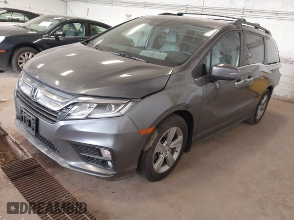 2018 Honda Odyssey EX-L z VIN 5FNRL6H79JB013982, wystawiony jako IAAI lot #42288040 z przebiegiem 82 416 mil mil oraz . Historia ofert i sprzedaży dostępna na DreamBid. Obrazek 2.