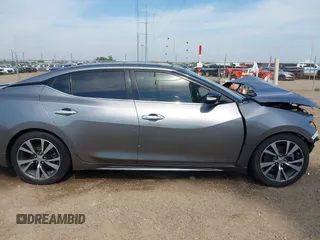 2016 Nissan Maxima SL z VIN 1N4AA6AP3GC392390, wystawiony jako IAAI lot #42260676 z przebiegiem 135 259 mil mil oraz . Historia ofert i sprzedaży dostępna na DreamBid. Obrazek 14.