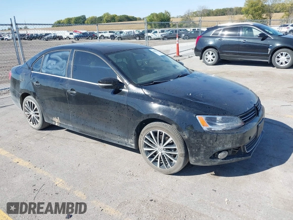 2012 Volkswagen Jetta Sedan SEL w/Sunroof with VIN 3VWLX7AJ2CM388825, listed as a IAAI auction lot 40490216 with 144,694 mi miles. Bid and sale history available at carsss.com. Image 1.