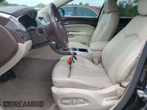2016 Cadillac SRX Luxury Collection with VIN 3GYFNBE35GS569577, listed as a Copart auction lot 62568755 with 65,305 mi miles and Salvage title. Bid and sale history available at DreamBid. Image 7.