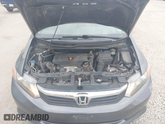 2012 Honda Civic LX z VIN 2HGFB2F58CH590369, wystawiony jako IAAI lot #42402397 z przebiegiem 202 116 mil mil oraz . Historia ofert i sprzedaży dostępna na DreamBid. Obrazek 10.
