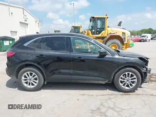 2022 Ford Escape SE with VIN 1FMCU0G69NUB35565, listed as a IAAI auction lot 42265525 with 27,711 mi miles and . Bid and sale history available at DreamBid. Image 14.