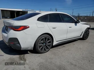 2022 BMW 4 Series 430i with VIN WBA63AV09NFM36850, listed as a Copart auction lot 49596085 with 51,405 mi miles and Salvage title. Bid and sale history available at DreamBid. Image 3.