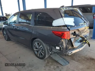 2021 Honda Odyssey Touring with VIN 5FNRL6H88MB040703, listed as a Copart auction lot 60340095 with 66,171 mi miles and Salvage title. Bid and sale history available at DreamBid. Image 2.