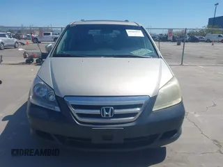 2006 Honda Odyssey EX-L with VIN 5FNRL38766B038599, listed as a IAAI auction lot 41989217 with 164,118 mi miles. Bid and sale history available at carsss.com. Image 13.